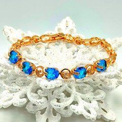 Браслет XUPING 40587.Позолота 18K. Голубі циркони с мелким розсипом белих.